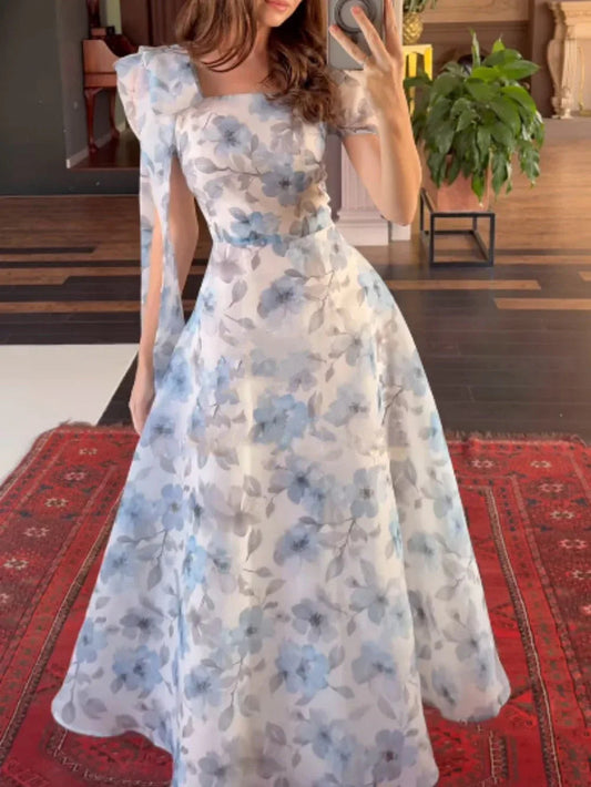 Elegant fitted printed dress with puff sleeves
